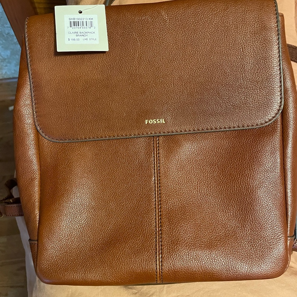 Claire Backpack by Fossil and matching wallet. Both new with tags, never used.